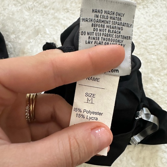 New Varsity Black Crossunder Uniform Bodysuit. Clear Straps Snap Closure. Size M - Picture 4 of 7